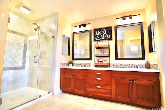 91-1103 Waikai St, Ewa Beach, HI 96706 - bathroom with a shower stall, tile patterned floors, double vanity, and tasteful backsplash