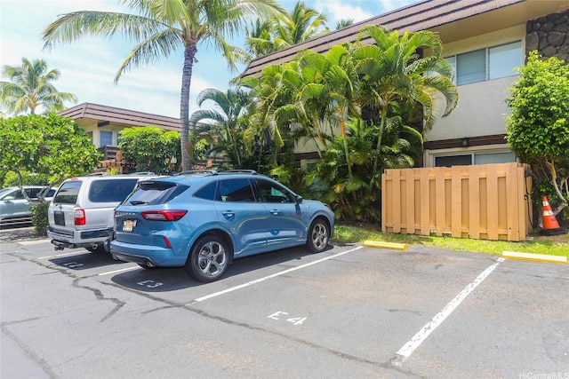 444 Lunalilo Home Rd Unit 226, Honolulu, HI 96825 - uncovered parking lot featuring fence
