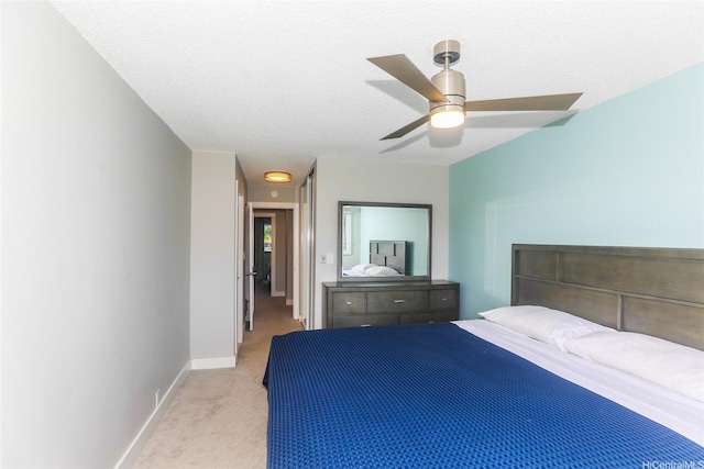 444 Lunalilo Home Rd Unit 226, Honolulu, HI 96825 - bedroom featuring light carpet, baseboards, and ceiling fan