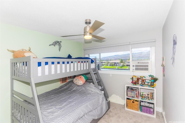444 Lunalilo Home Rd Unit 226, Honolulu, HI 96825 - carpeted bedroom featuring a ceiling fan and a textured ceiling