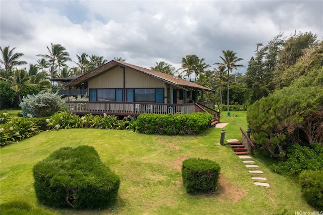 56-189 Kamehameha Hwy, Kahuku, HI 96731 - view of green lawn with a deck and stairway