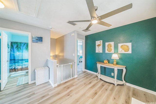 91-2222 Kanela St Unit T88, Ewa Beach, HI 96706 - hallway with wood finished floors, an upstairs landing, and baseboards
