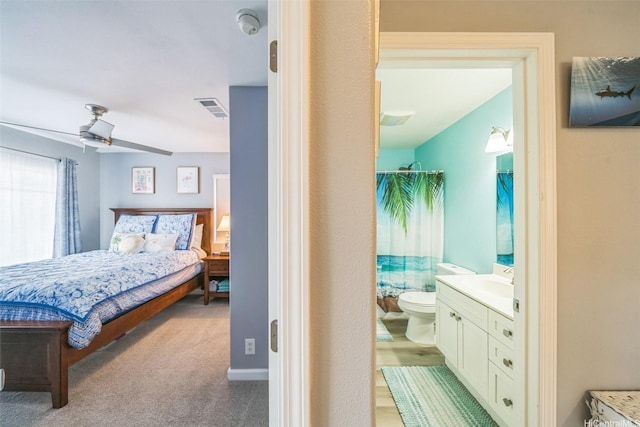91-2222 Kanela St Unit T88, Ewa Beach, HI 96706 - carpeted bedroom featuring ensuite bathroom