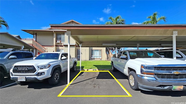 91-540 Puamaeole St Unit 49D, Ewa Beach, HI 96706 - uncovered parking lot featuring stairway