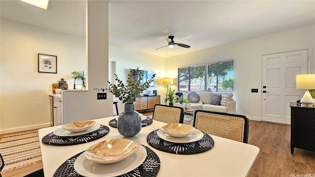 91-540 Puamaeole St Unit 49D, Ewa Beach, HI 96706 - dining space featuring wood finished floors, a ceiling fan, and baseboards