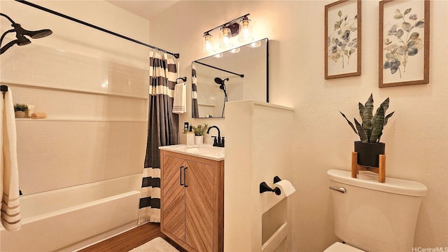 91-540 Puamaeole St Unit 49D, Ewa Beach, HI 96706 - full bathroom with toilet, shower / bathtub combination with curtain, vanity, and wood finished floors