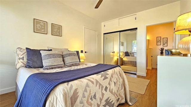 91-540 Puamaeole St Unit 49D, Ewa Beach, HI 96706 - bedroom featuring wood finished floors, a closet, baseboards, and ceiling fan