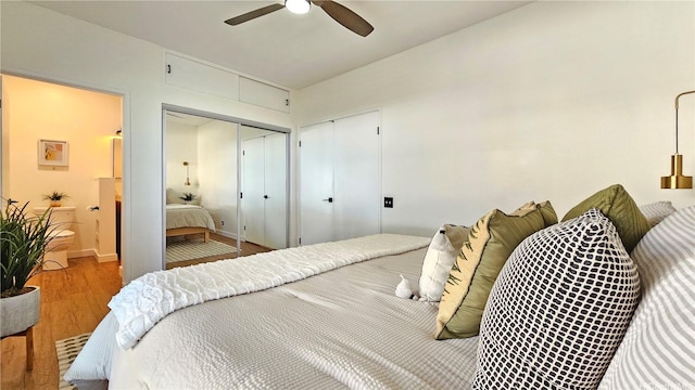 91-540 Puamaeole St Unit 49D, Ewa Beach, HI 96706 - bedroom featuring wood finished floors, ensuite bathroom, and ceiling fan