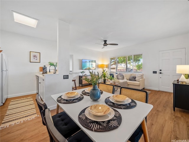 91-540 Puamaeole St Unit 49D, Ewa Beach, HI 96706 - dining space featuring light wood-style flooring and ceiling fan