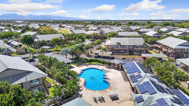 91-540 Puamaeole St Unit 49D, Ewa Beach, HI 96706 - aerial perspective of suburban area featuring a pool area
