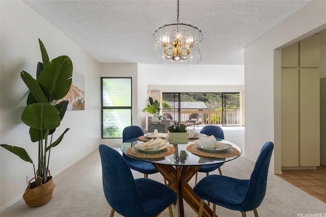 1630 Kalaniiki St Unit 31, Honolulu, HI 96821 - dining area with a chandelier, carpet flooring, and a textured ceiling