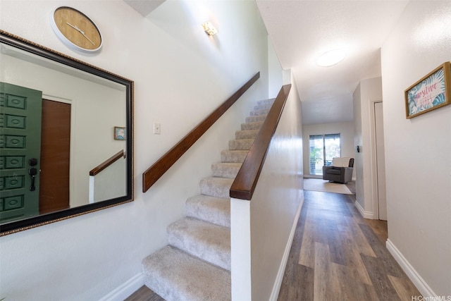 92-1210 Makakilo Dr Unit 5, Kapolei, HI 96707 - stairway featuring wood finished floors and baseboards