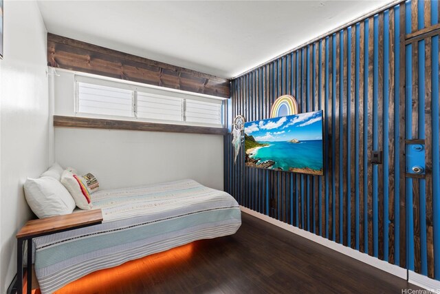 419 Keoniana St Unit 1003, Honolulu, HI 96815 - bedroom featuring wood finished floors and baseboards