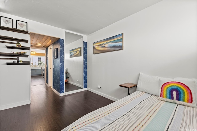 419 Keoniana St Unit 1003, Honolulu, HI 96815 - unfurnished bedroom featuring wood finished floors and baseboards