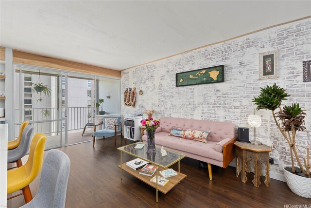 419 Keoniana St Unit 1003, Honolulu, HI 96815 - living room featuring wood finished floors and brick wall