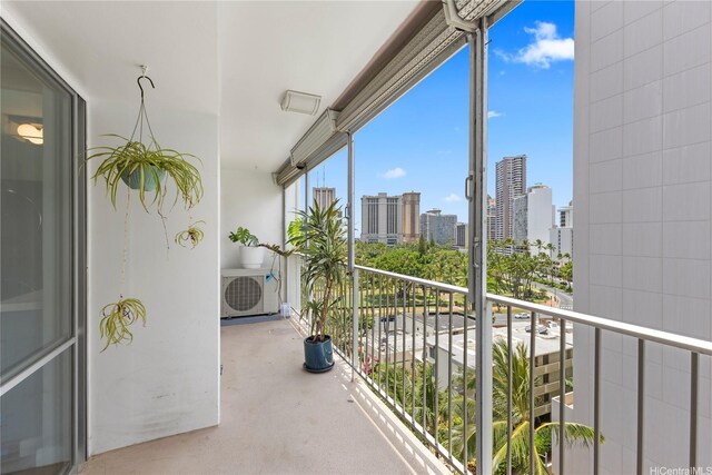 419 Keoniana St Unit 1003, Honolulu, HI 96815 - balcony with a skyline view and a cooling unit