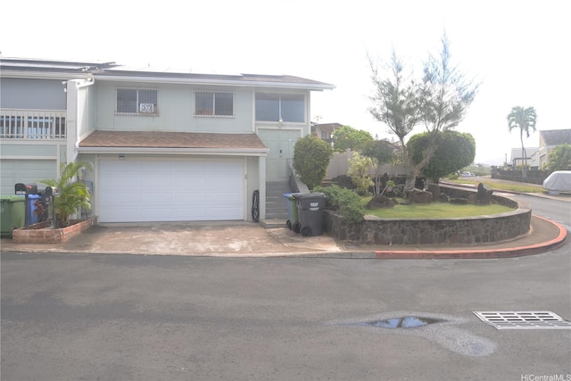 98-524 Lulu Pl Unit 84, Aiea, HI 96701 - view of front facade with a garage and concrete driveway