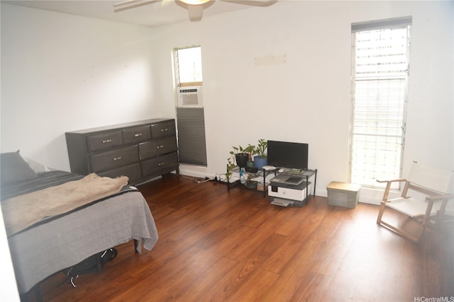 98-524 Lulu Pl Unit 84, Aiea, HI 96701 - bedroom featuring wood finished floors, multiple windows, cooling unit, and a ceiling fan