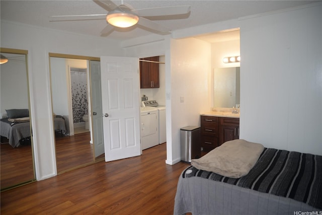 98-524 Lulu Pl Unit 84, Aiea, HI 96701 - bedroom with washer and clothes dryer, dark wood-style flooring, multiple closets, ceiling fan, and ensuite bathroom