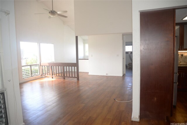 98-524 Lulu Pl Unit 84, Aiea, HI 96701 - empty room featuring ceiling fan, wood finished floors, plenty of natural light, and high vaulted ceiling