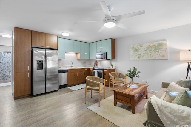 1310 Pensacola St Unit 106, Honolulu, HI 96814 - living room featuring light wood finished floors and a ceiling fan
