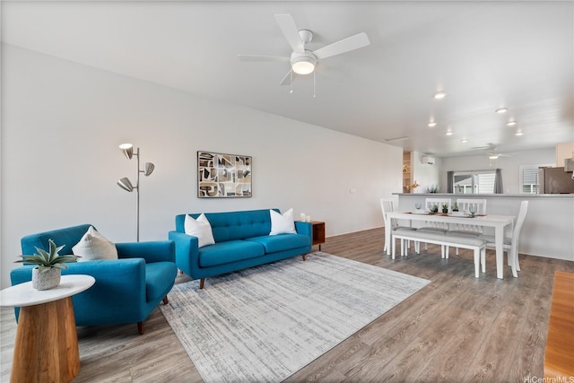 91-1785 Kohanahana Loop, Ewa Beach, HI 96706 - living area featuring a ceiling fan and wood finished floors