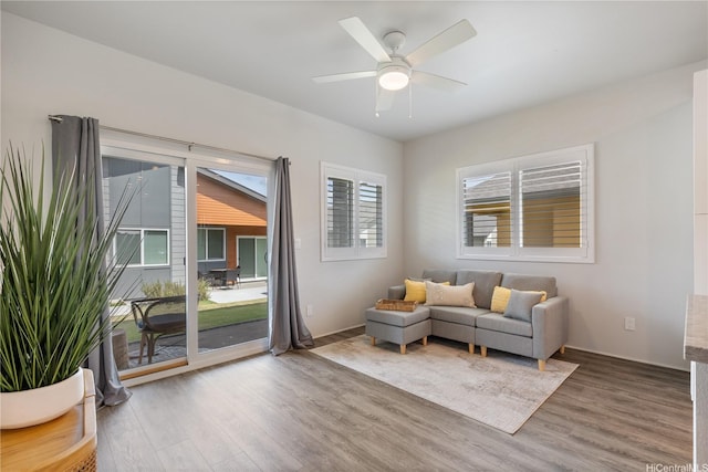 91-1785 Kohanahana Loop, Ewa Beach, HI 96706 - living room featuring light wood-style floors and ceiling fan