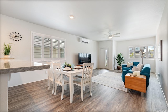 91-1785 Kohanahana Loop, Ewa Beach, HI 96706 - dining space featuring a wall unit AC, wood finished floors, and ceiling fan