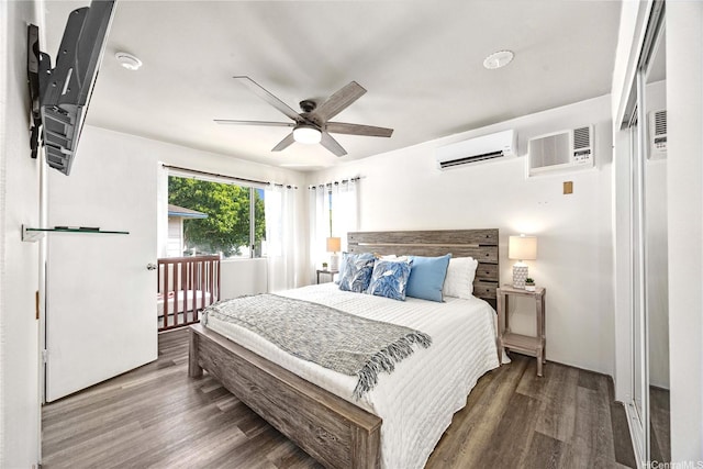 91-1026 Laulauna St Unit 10A, Ewa Beach, HI 96706 - bedroom with a wall mounted AC, wood finished floors, and ceiling fan