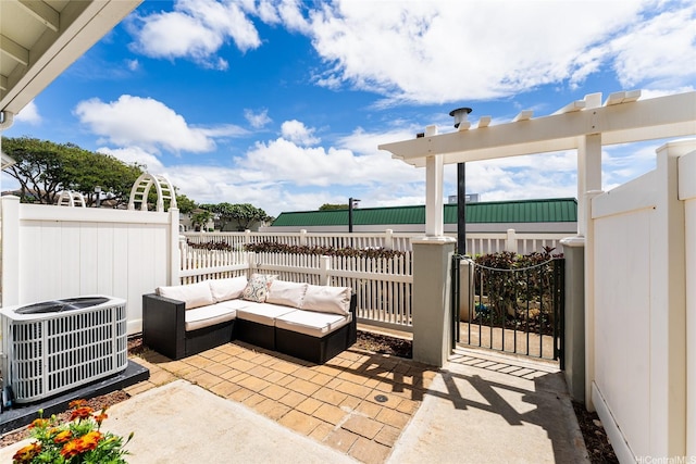 91-1031 Kaimalie St Unit 4P4, Ewa Beach, HI 96706 - view of patio / terrace featuring central air condition unit and an outdoor living space