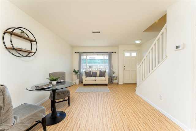 91-1031 Kaimalie St Unit 4P4, Ewa Beach, HI 96706 - foyer entrance featuring baseboards, stairway, and wood finished floors