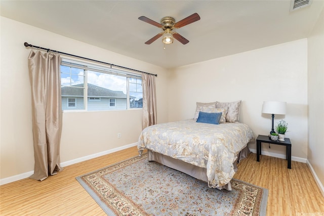 91-1031 Kaimalie St Unit 4P4, Ewa Beach, HI 96706 - bedroom with light wood-type flooring, baseboards, and ceiling fan