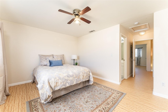 91-1031 Kaimalie St Unit 4P4, Ewa Beach, HI 96706 - bedroom with light wood-type flooring, baseboards, attic access, and ceiling fan