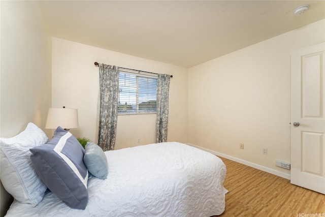 91-1031 Kaimalie St Unit 4P4, Ewa Beach, HI 96706 - bedroom with light wood-type flooring and baseboards