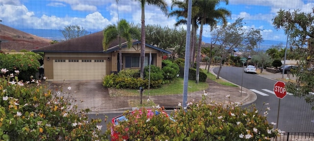 92-1366PUNAWAINUIST Punawainui St, Kapolei, HI 96707 - view of front facade featuring a garage, asphalt driveway, and roof with shingles