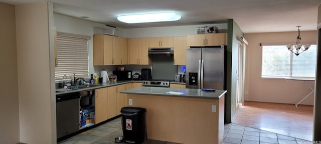92-1366PUNAWAINUIST Punawainui St, Kapolei, HI 96707 - kitchen with appliances with stainless steel finishes, light brown cabinets, under cabinet range hood, light tile patterned floors, and a chandelier
