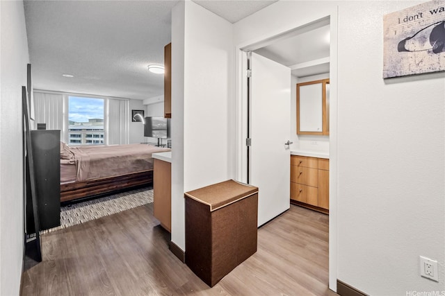 7000 Hawaii Kai Dr Unit 2702, Honolulu, HI 96825 - corridor with light wood-style floors