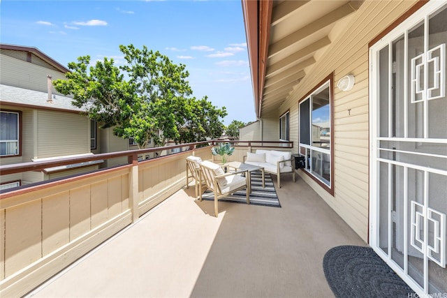 91-1059 Puaniu St Unit 21T, Ewa Beach, HI 96706 - view of patio with an outdoor hangout area and a balcony