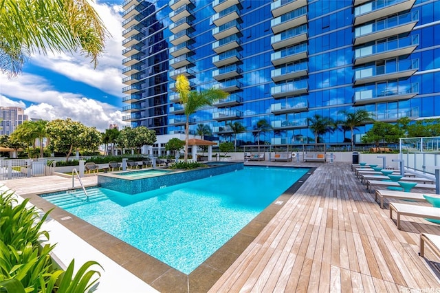 600 Ala Moana Blvd Unit 1907, Honolulu, HI 96813 - view of pool featuring fence and a pool with connected hot tub