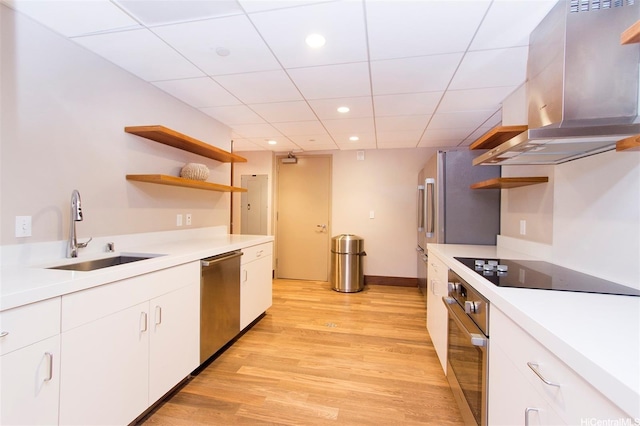 600 Ala Moana Blvd Unit 1907, Honolulu, HI 96813 - kitchen featuring open shelves, stainless steel appliances, a sink, range hood, and light wood-style floors