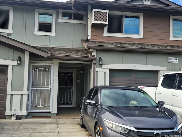 91-1227 Kamaaha Ave Unit 302, Kapolei, HI 96707 - property entrance with an attached garage