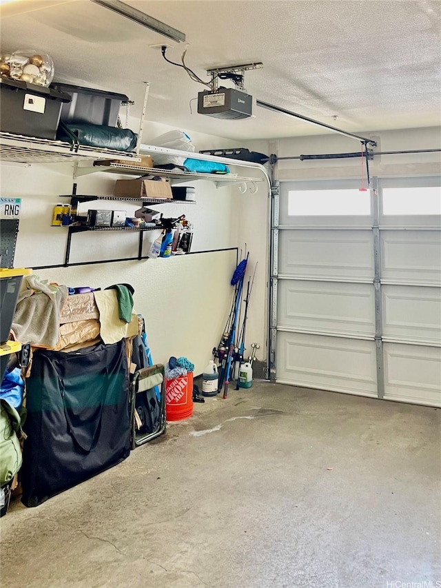 91-1227 Kamaaha Ave Unit 302, Kapolei, HI 96707 - garage featuring a garage door opener