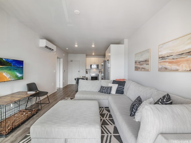 91-3641 Iwikuamoo St Unit 9408, Ewa Beach, HI 96706 - living area featuring a wall mounted air conditioner, wood finished floors, and recessed lighting