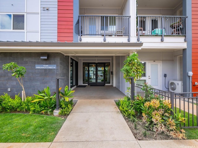 91-3641 Iwikuamoo St Unit 9408, Ewa Beach, HI 96706 - entrance to property with a balcony, french doors, a cooling unit, and fence