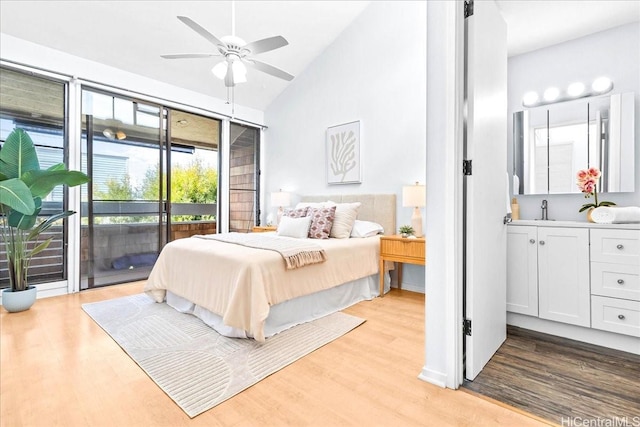 333 Aoloa St Unit 329, Kailua, HI 96734 - bedroom featuring access to outside, vaulted ceiling, light wood finished floors, and a sink
