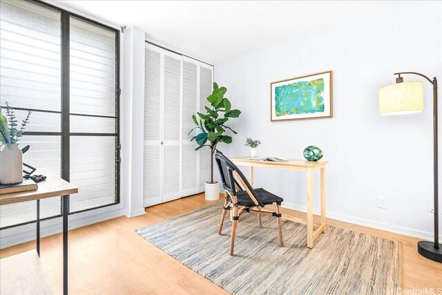 333 Aoloa St Unit 329, Kailua, HI 96734 - office area with wood finished floors and baseboards
