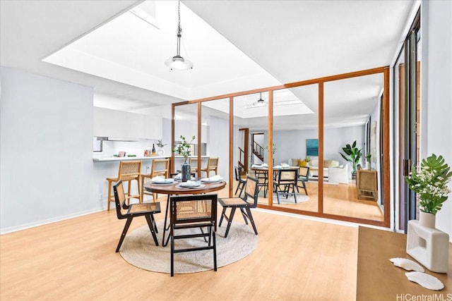 333 Aoloa St Unit 329, Kailua, HI 96734 - dining room featuring light wood-type flooring and baseboards