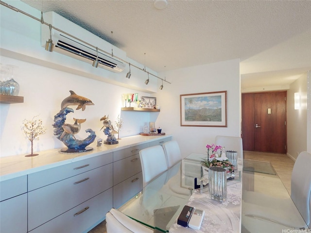 1015 Wilder Ave Unit 1003, Honolulu, HI 96822 - dining space with a textured ceiling