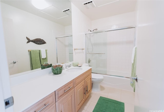 769 Elepaio St, Honolulu, HI 96816 - bathroom with tile patterned flooring, vanity, shower / bath combination with glass door, and toilet