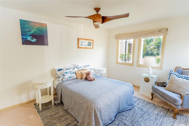 769 Elepaio St, Honolulu, HI 96816 - carpeted bedroom with baseboards and a ceiling fan
